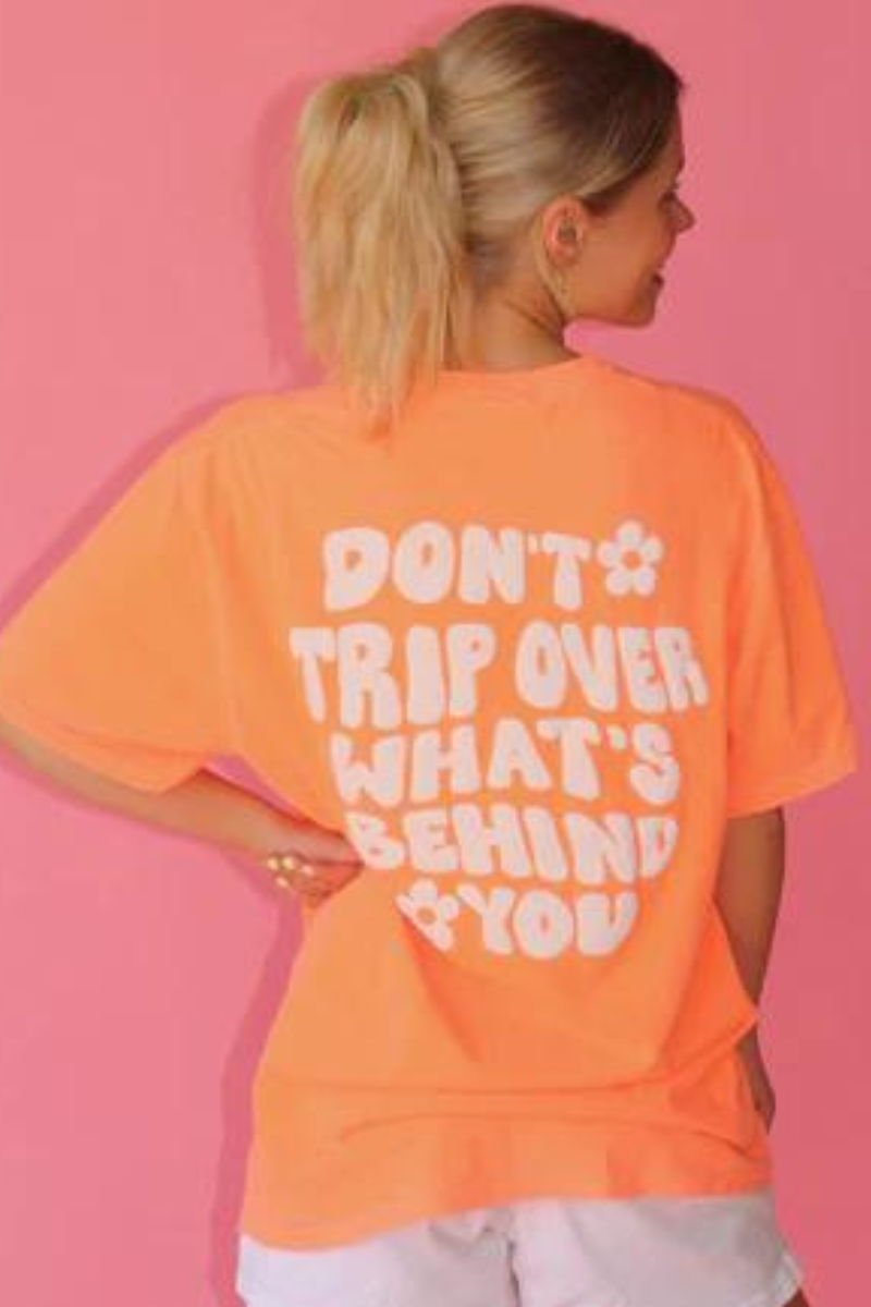 'DON'T TRIP OVER WHAT'S BEHIND YOU' Oversized tshirt /ORANGE