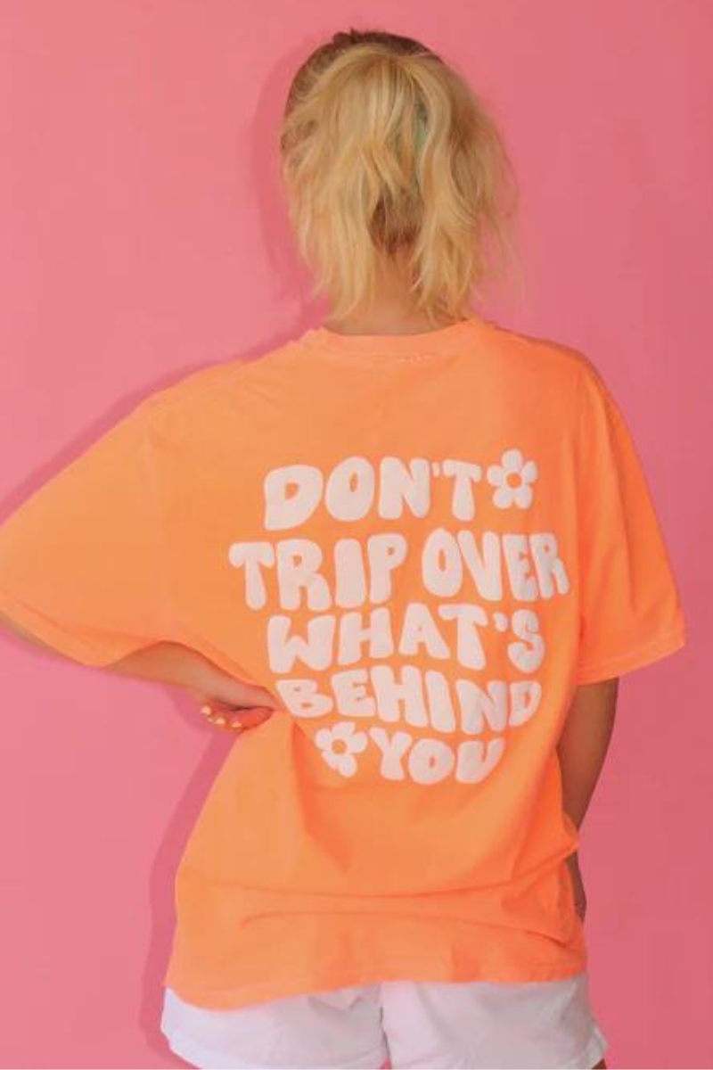 'DON'T TRIP OVER WHAT'S BEHIND YOU' Oversized tshirt /ORANGE